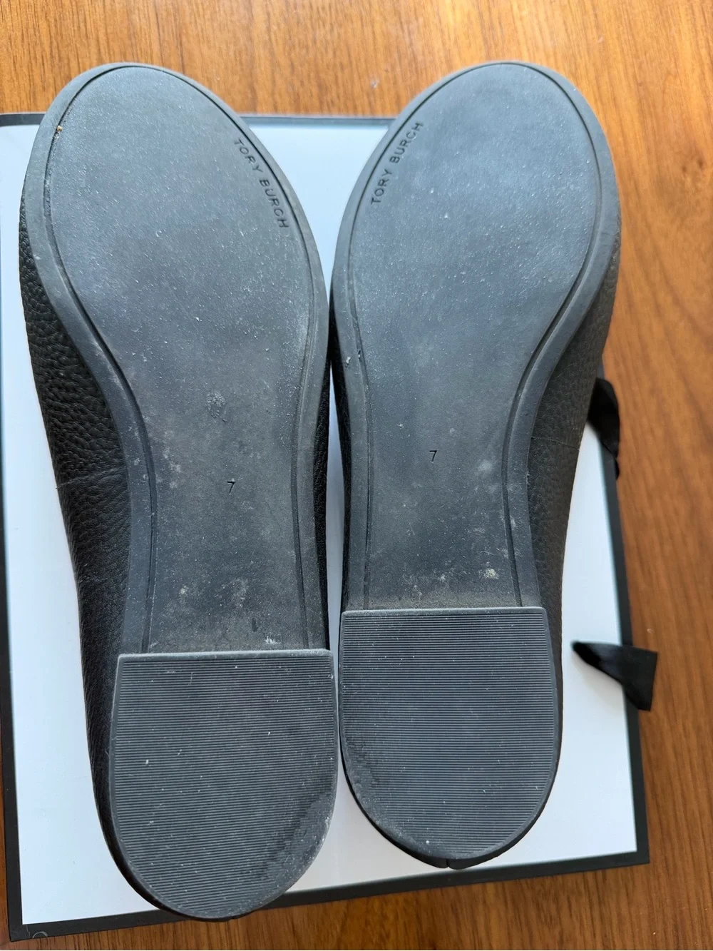 Tory Burch Black Pebbled Leather Logo Ballet Flats with Gold Medallions